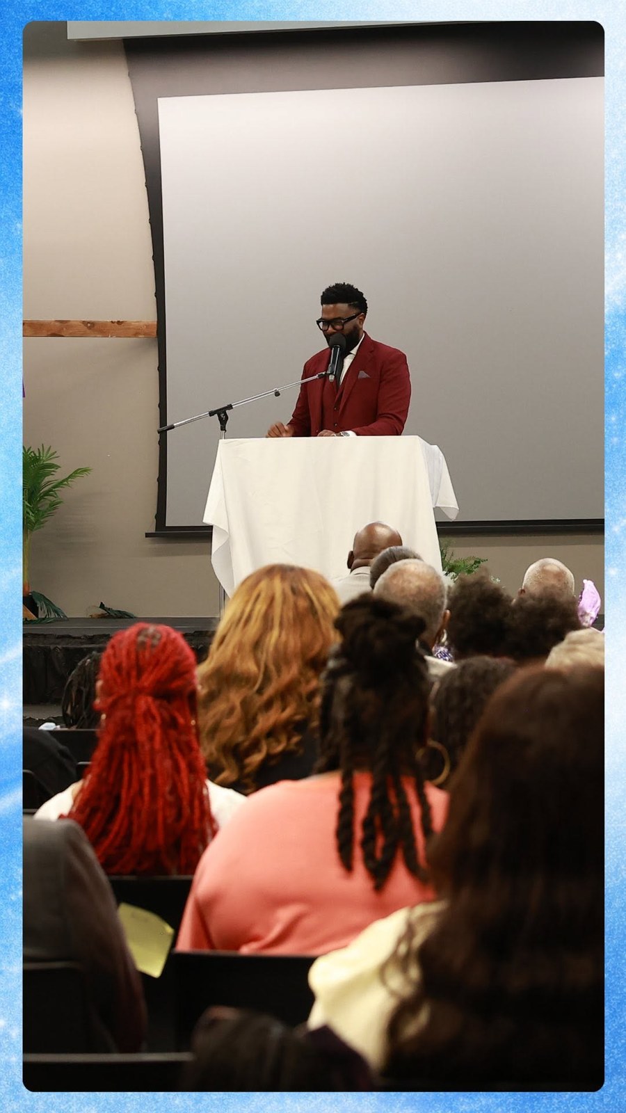 Pastor speaking to the One Faith congregation